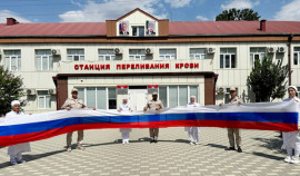 Военнослужащие ОГВ(с) провели акцию ко Дню Государственного флага РФ