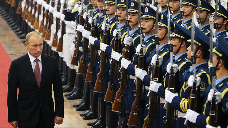 Путин: Россия придает приоритетное значение развитию отношений с Китаем